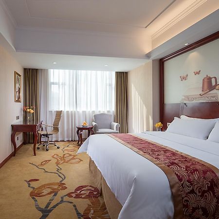 Vienna Hotel Zhongshan Guzhen Town Center Exterior foto