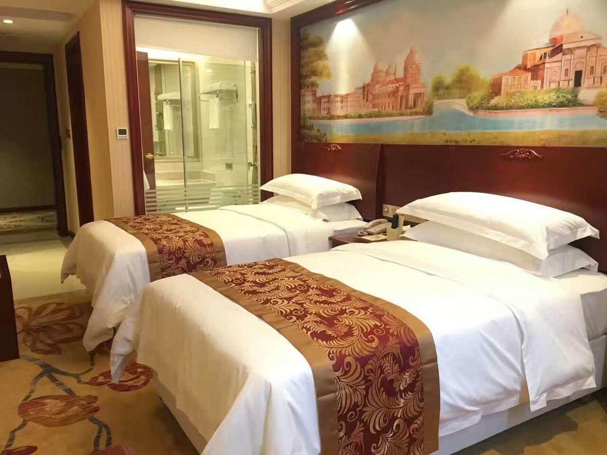 Vienna Hotel Zhongshan Guzhen Town Center Exterior foto